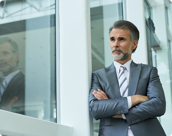 Building owner reviewing property systems and compliance